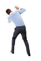 Back view of shocked and scared young business man. Holds hands