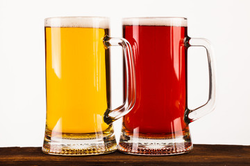 mugs of beer on table