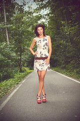 Beautiful slim brunette in a nature