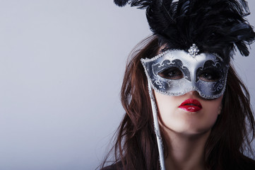 beautiful young girl with venetian mask