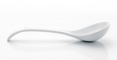 white porcelain scoop on white base