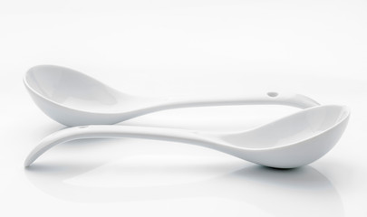 white porcelain scoop on white base