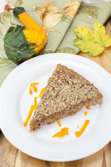 Pumpkin pie. Pumpkin pie in a pie plate with autumn decorations