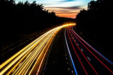 Tuinposter Car lights on a highway at night © Andrzej Wilusz