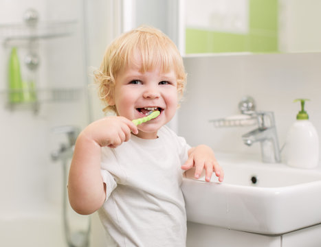 Happy Kid Brushing Teeth