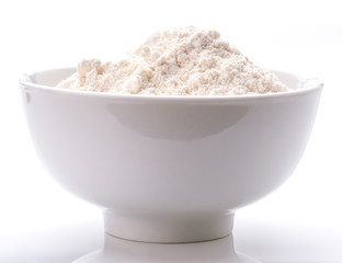 white porcelain bowl filled with flour