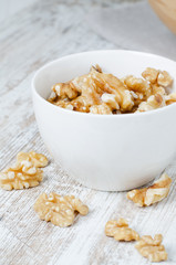 Walnuts in a white cup