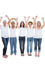 Fototapeta premium Cheerful casual models posing with hands up