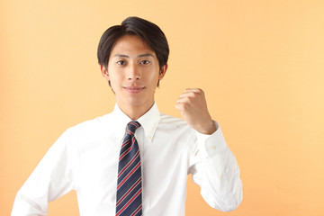 ビジネスマン　ガッツポーズ