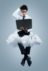 Businessman having problems with cloud computing technology