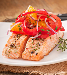 Baked salmon with a salad of sweet peppers and oranges