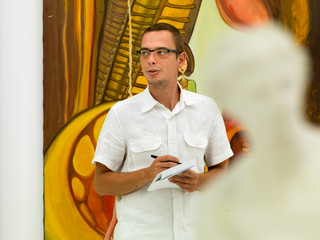 art collector at exhibition opening