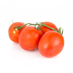 Red tomato isolated over white background