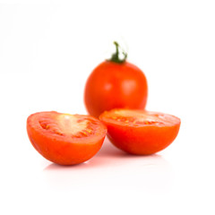 Red tomato isolated over white background