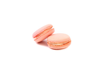 Two pink macaron cakes.