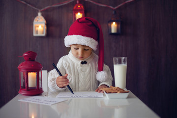 Boy, writing to Santa