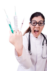 Woman doctor with syringe on white