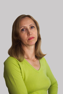 A Woman In A Green Blouse