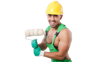 Painter in green coveralls on white