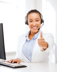 african female helpline operator showing thumbs up