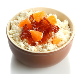 cottage cheese in bowl with homemade tangerine jam, isolated