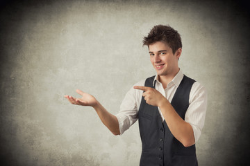 Young man pointing