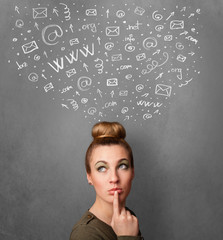 Young woman thinking with social network icons above her head