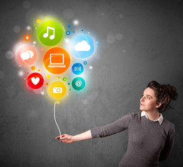 Woman holding social media balloon