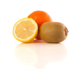 Healthy tropical fresh fruits on white background