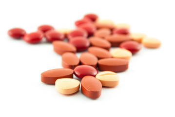 An assortment of pills, tablets isolated on white background