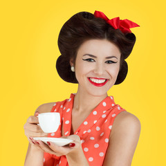 Pin-up style girl with cup of coffee
