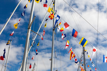 Colourful signal flags on a sailing boat