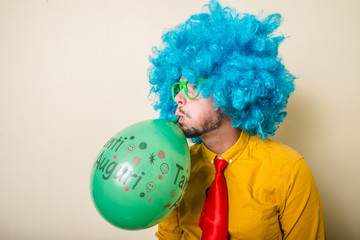 Naklejka premium crazy funny young man with blue wig
