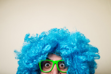 crazy funny bearded man with blue wig