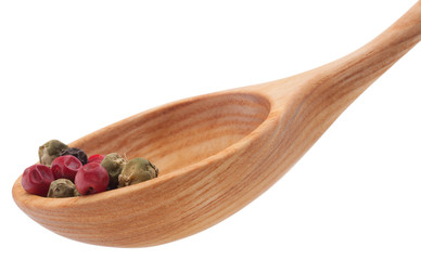 Pepper seasoning  mix in wooden spoon isolated on white backgrou