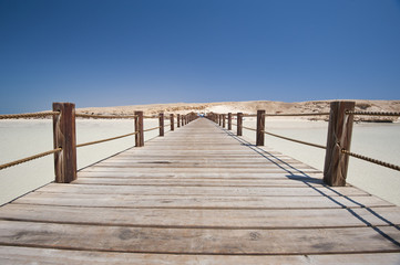 Obraz premium Wooden jetty on a tropical island