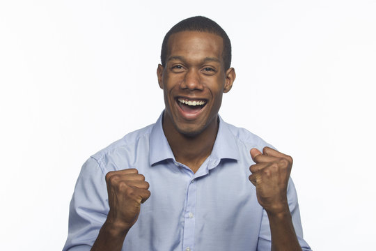 Young African-American man excited and cheering, horizontal