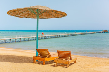 Relax under parasol on the beach of Red Sea, Egypt
