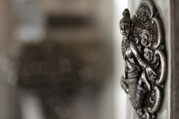 Silver buddhism sculpture