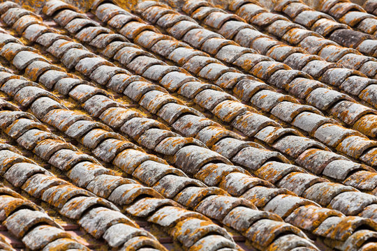 Close up image on very old roof tiles