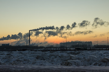 Factory and sunset in winter