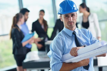 business people and engineers on meeting