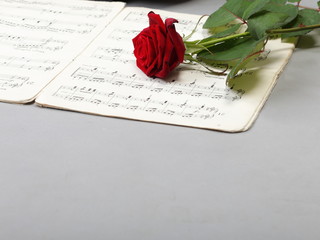 red rose and old notes Sheet music