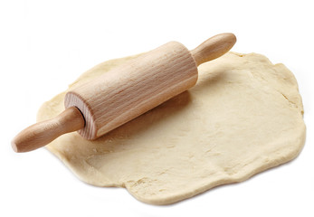Wooden rolling pin and dough