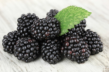 Sweet blackberries on table close-up