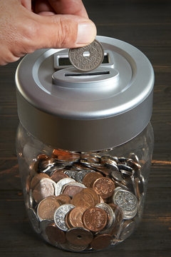 Saving money in a coin jar