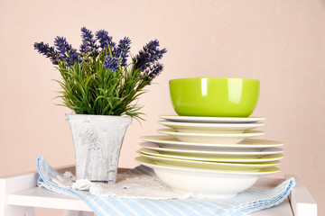 Beautiful white shelves with tableware and decor,