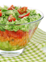 Tasty salad with fresh vegetables, isolated on white