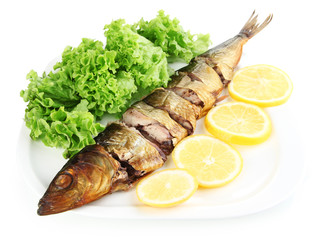 Smoked fish on plate isolated on white