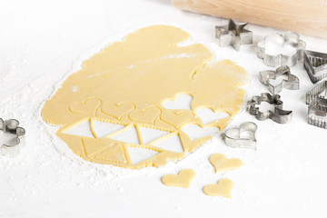 still life of dough with cookie cutters